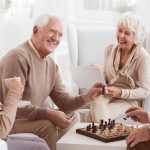 Aged,People,Playing,Chess,Together,In,Day-care,Center